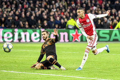 AMSTERDAM, 10-12-2019 , JohanCruyff Arena, season 2019 / 2020 of the UEFA Champions League between Ajax and FC Valencia. Shot on goal of Ajax player Hakim Ziyech