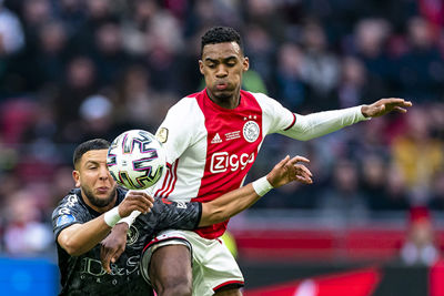 AMSTERDAM, 19-01-2020, football, Johan Cruijff ArenA, Dutch eredivisie, season 2019-2020, Sparta player Mohamed Rayhi (L), Ajax player Ryan Gravenberch (R), during the match Ajax - Sparta,