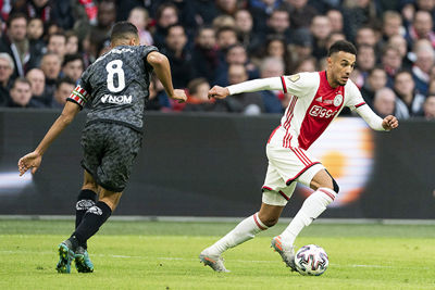 AMSTERDAM, 19-01-2020 JohanCruyff Arena , Dutch Eredivisie Football season 2019 / 2020 .  Sparta player Adil Auassar  and Ajax player Noussair Mazraoui during the match Ajax - Sparta Rotterdam