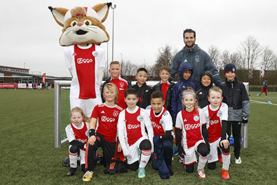 Natuurlijk is Lucky van de partij voor de teamfoto