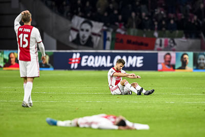 AMSTERDAM, 10-12-2019 , JohanCruyff Arena, season 2019 / 2020 of the UEFA Champions League between Ajax and FC Valencia. /a15/ and Ajax player Joel Veltman dejected after the lost game