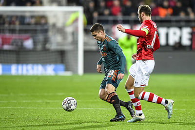 ALKMAAR, 15-12-2019 , AFAS Stadium, Dutch Football Eredivisie Season 2019 / 2020. AZ - Ajax . Ajax player Razvan Marin (L), AZ player Teun Koopmeiners (R)