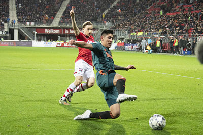 ALKMAAR, 15-12-2019 , AFAS Stadium, Dutch Football Eredivisie Season 2019 / 2020. AZ - Ajax . AZ Player Jonas Svensson and Ajax player Edson Alvarez